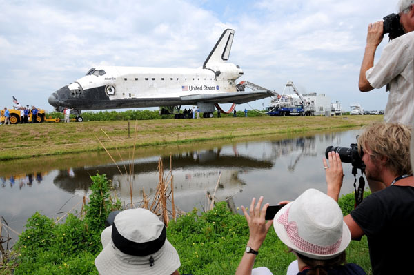 Atlantis is towed back to the OPF after its final landing.